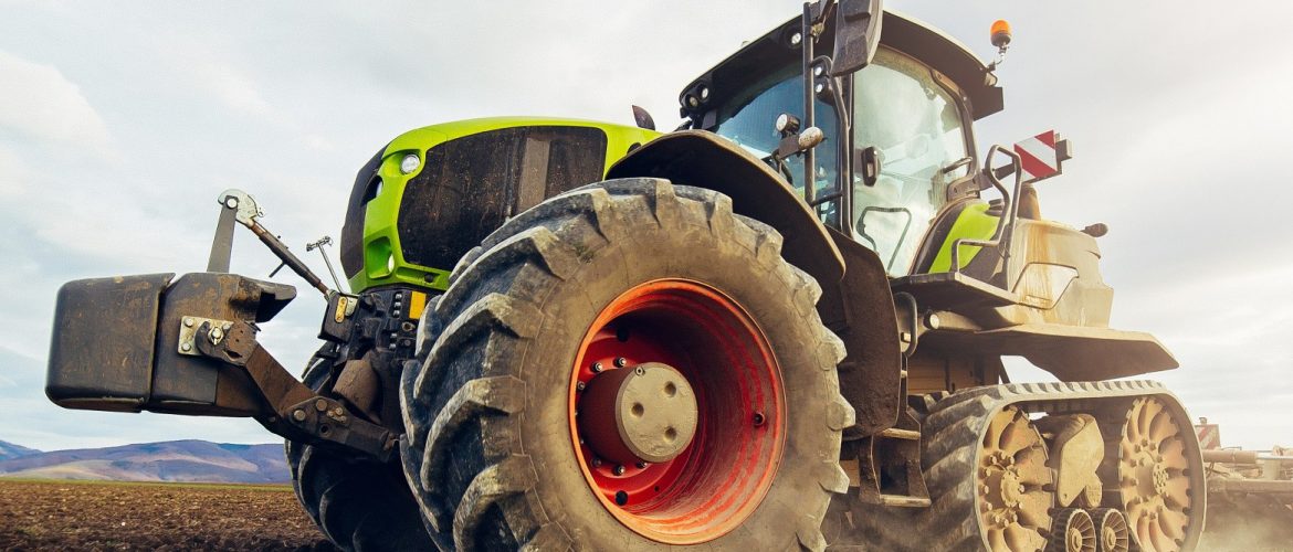 modern-tractor-working-on-the-farm-a-modern-agric-2023-11-27-05-04-07-utc_1562x1050